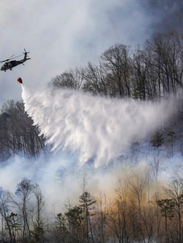 South Carolina wildfire keeps growing as firefighters protect homes